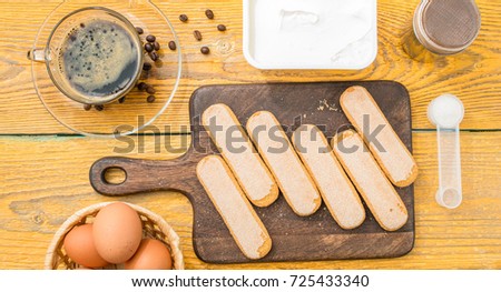 Image on top of table with savoyardi cookies
