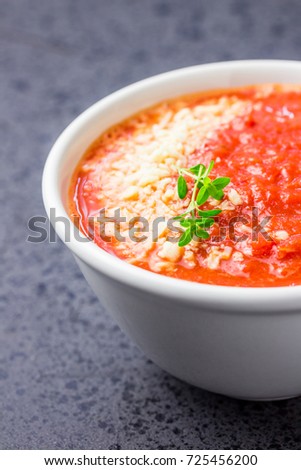 Tomato bisque soup. Selective focus, space for text.