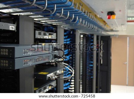 Communication racks (datacenter) Royalty-Free Stock Photo #725458