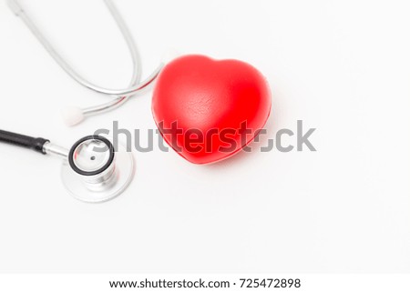 Red heart and a stethoscope. Isolated on white background. Studio lighting. Concept for healthy and medical