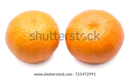 Two whole Clementines isolated on white background
