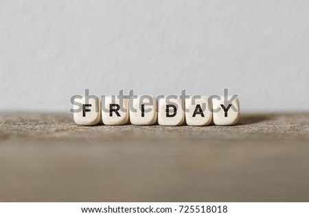 Word FRIDAY made with wood building blocks,stock image