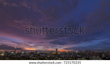 Twilight sky in evening with silhouette city. / Beautiful sky and silhouette city. / Abstract Background. ( Panorama View ) Royalty-Free Stock Photo #725570335