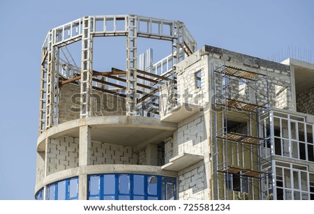 building under construction against the blue sky