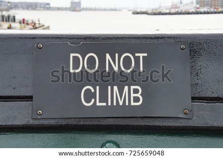 Do Not Climb Sign On Stern Of Ship