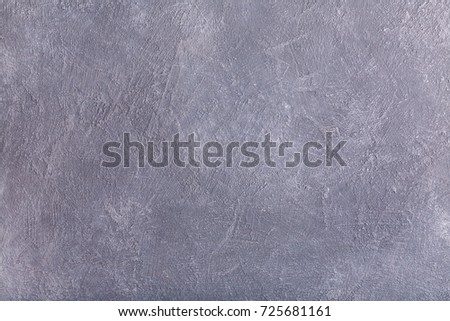 Rustic dark gray textured background with bright areas