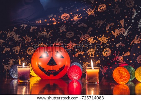 Halloween theme pumpkin and colorful sphere shape decorative light with candle