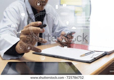 Medicine doctor working with digital tablet at desk in the hospital. Medical technology concept