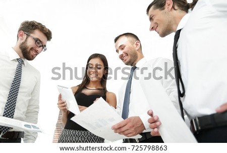 closeup of business team looking at the working papers