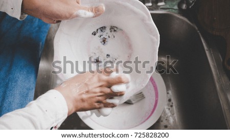 Washing dishes at home