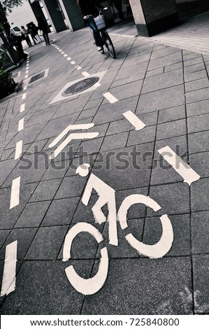bike lane on footpath, old film look effect