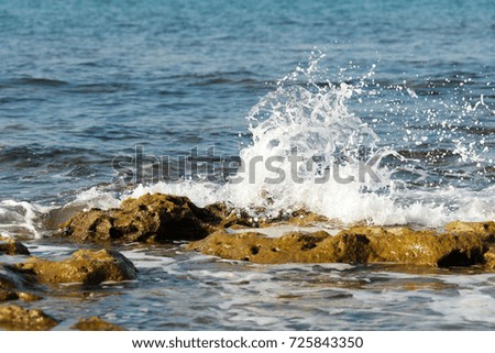 sea wave stones foam water