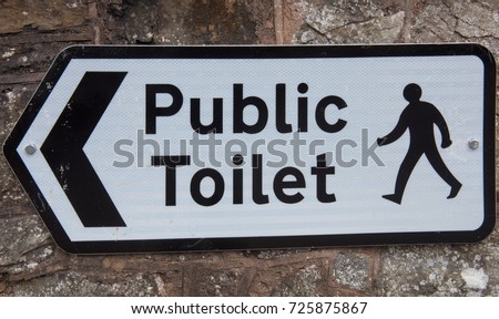 "Public Toilet" Sign in the Market Town of Chulmleigh in Rural Devon, England, UK