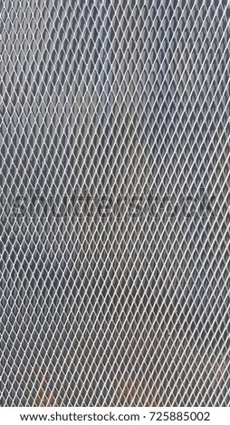 Steel grating pattern background,Metal grid with diamond pattern on black background