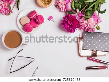 Pink peonies, coffee with milk and cute feminine accessories on the white background Royalty-Free Stock Photo #725892433