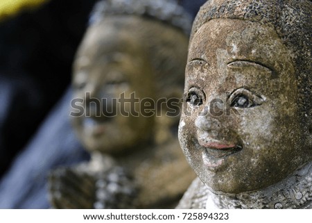 Doll stucco Smiling child
