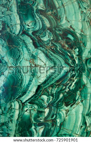 green copper ore texture macro, green malachite stone Royalty-Free Stock Photo #725901901