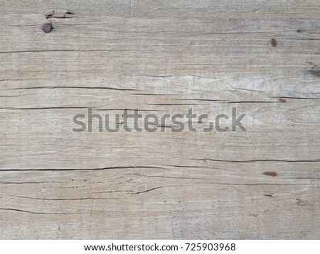 Wood Background Texture. Planks of wood damaged by the aging process.
Vintage wood background texture with knots and nail holes,Nail tack. Royalty-Free Stock Photo #725903968