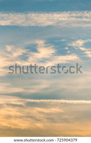 clouds in the sky at sunset as background
