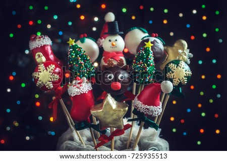 Christmas cake pops with bokeh lights in background 