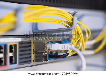 Optical cable in rack cabinet. Closeup photo
