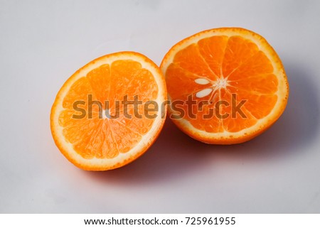 Orange on white background with shadow
