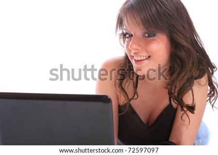 Beautiful and happy girl with a laptop