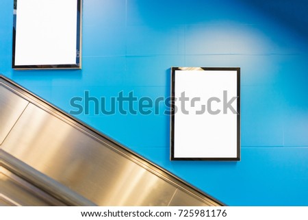 Mock up poster media template ads display in Subway station escalator