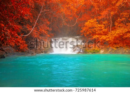 Waterfalls and dunes, orange summer trees and blue water