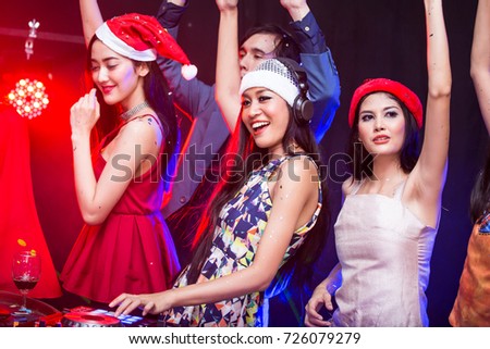 Group of young Asian Women Dancing Together in Nightcub.  Woman Dancing with Attractives Smiling. People with Party Concept.