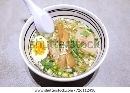 Shio ramen. Ramen is a Japanese dish. A wheat noodles served in a meat or fish based broth, often flavored with soy sauce or miso, and uses toppings such as sliced pork, seaweed, and green onions.