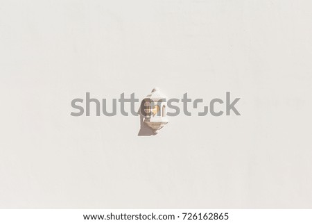 Lantern on a white wall