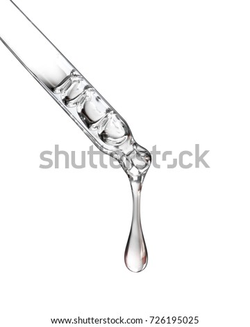 Cosmetic pipette with a drop close up on white background  Royalty-Free Stock Photo #726195025