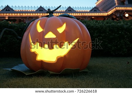 Scary Halloween pumpkin lantern decoration in the park