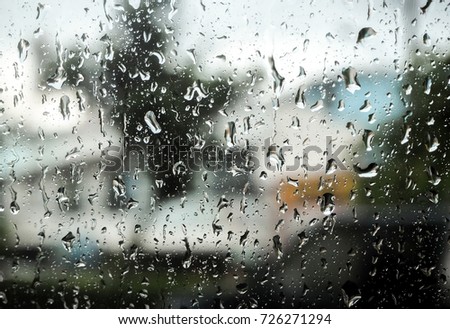 Water droplets attached to the glass/steam/Raining attached on the glass
