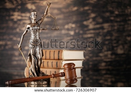 Justice statue and book.