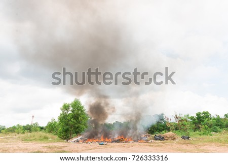 Burning garbage in the fields.Create pollution for the world.The cause of global warming.