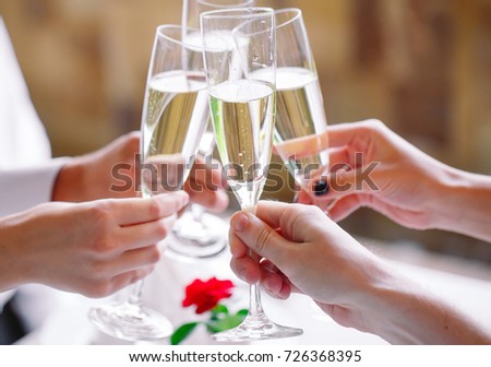 Friends in restaurant having a toast