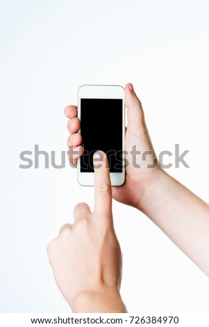 Man hand holding the white smartphone