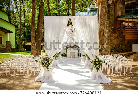 Place for wedding ceremony in white color ,with white fireplace  Royalty-Free Stock Photo #726408121