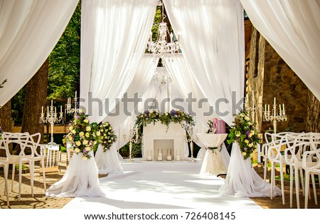 Place for wedding ceremony in white color ,with white fireplace  Royalty-Free Stock Photo #726408145