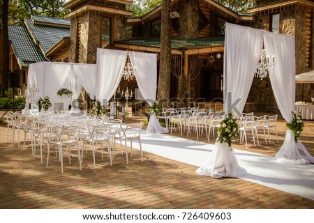 Place for wedding ceremony in white color ,with white fireplace  Royalty-Free Stock Photo #726409603