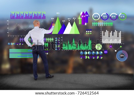 View of a Businessman in front of a wall with a Business interface with chart graph and stats - Business and financial concept