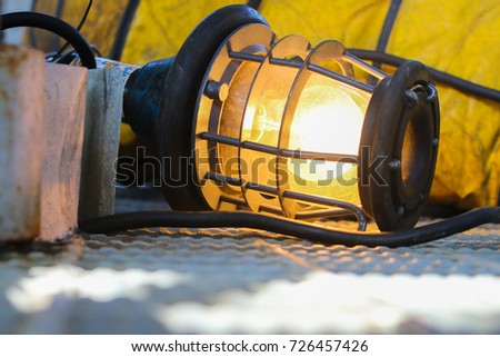 Bulb lights used in lighting for confined space activity. Royalty-Free Stock Photo #726457426