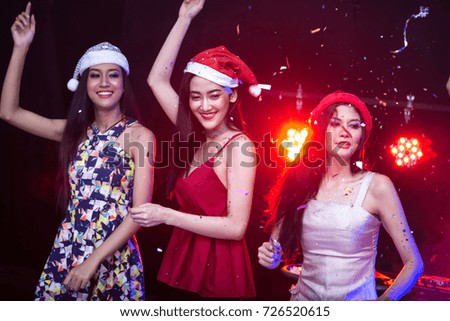 Group of young Asian Women Dancing Together in Nightcub.  Woman Dancing with Attractives Smiling. People with Party Concept.