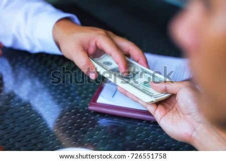 image of a businessman negotiating a financial deal. Loan agreement