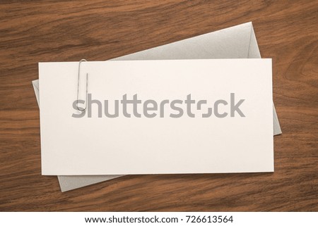 Envelope on wooden background