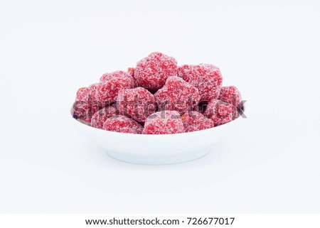 Tamarind Seasoned with sweet and sour taste. To eat snacking a good dipping paste on a plastic plate with a white background.                         Royalty-Free Stock Photo #726677017