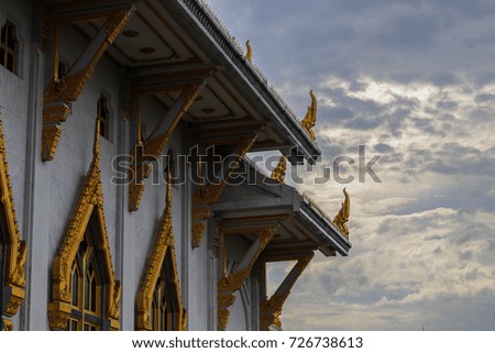 Beautiful Temple roof l in Thailand with beautiful sky