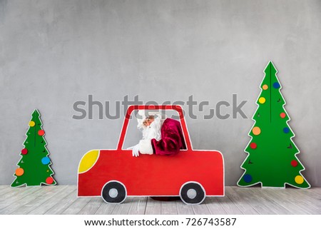 Santa Claus riding car. Christmas Xmas holiday concept